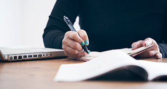 A student taking notes.