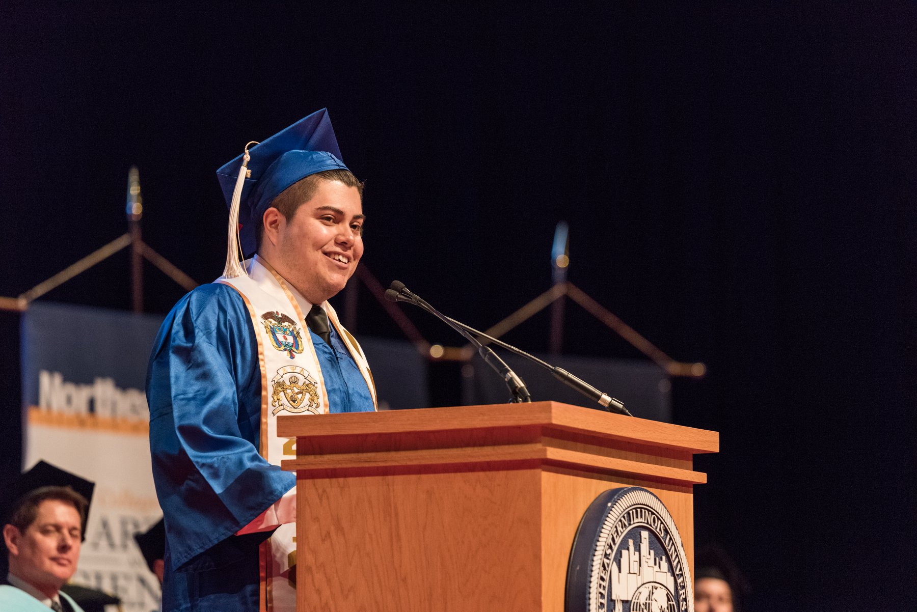 The Class Gift speaker stands at the Commencement podium in May 2018.