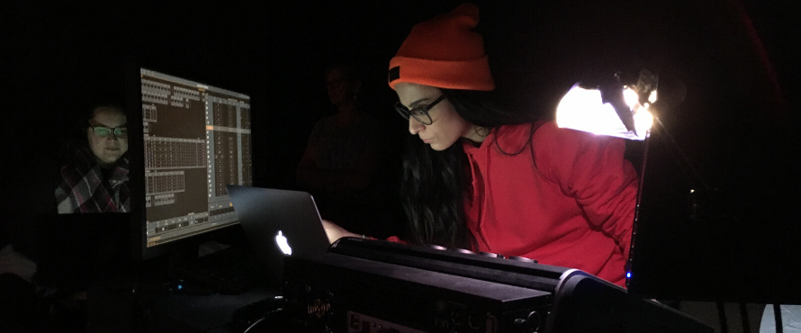 student works as a stage manager