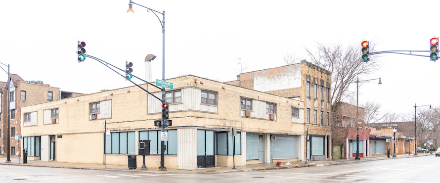 A brick building is shown at the corner of Bryn Mawr and Kimball