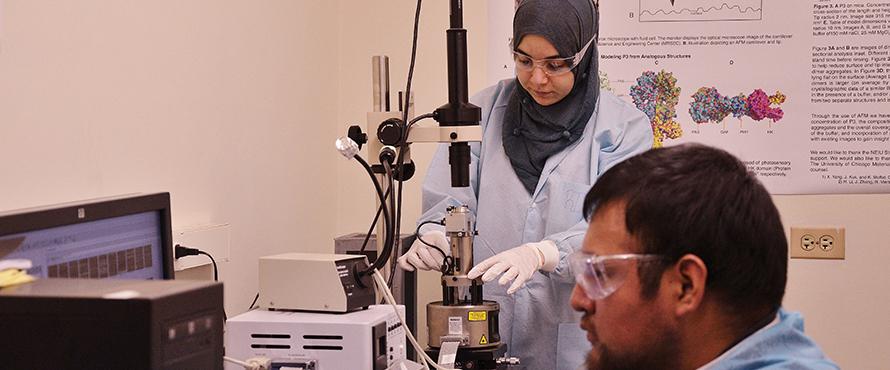 NEIU students performing chemistry experiments