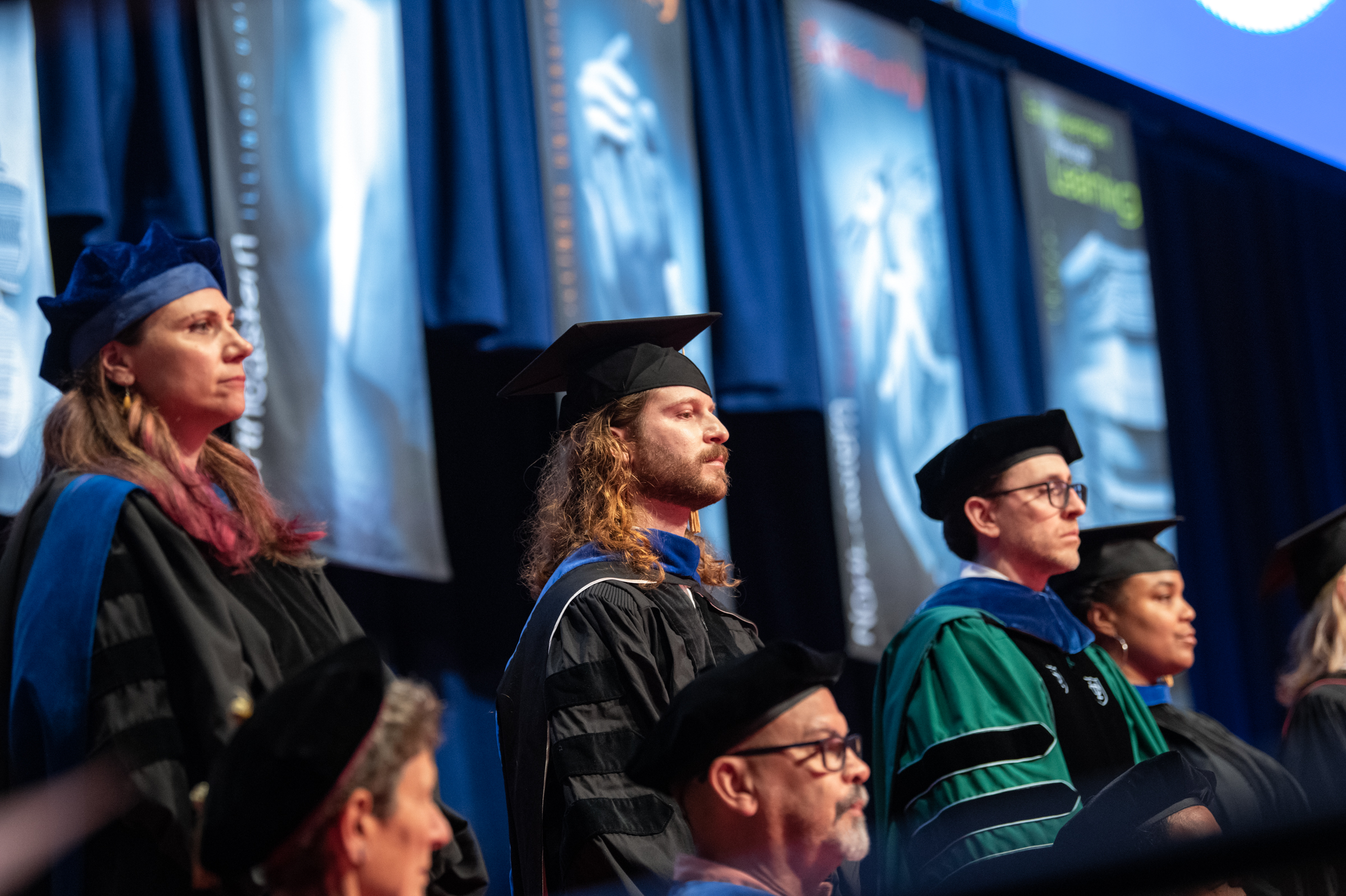 Faculty members at a commencement ceremony