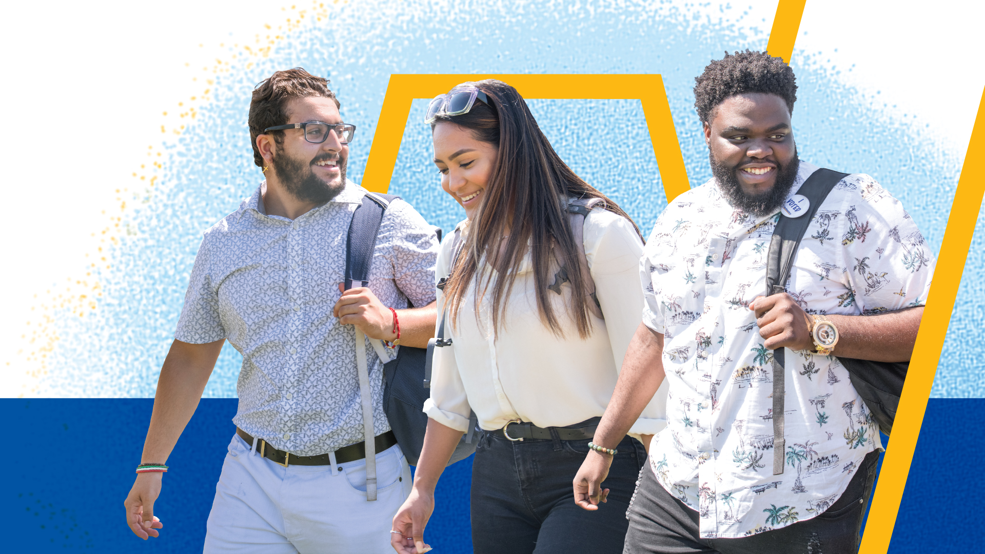 Three students walking while engaging in conversation.