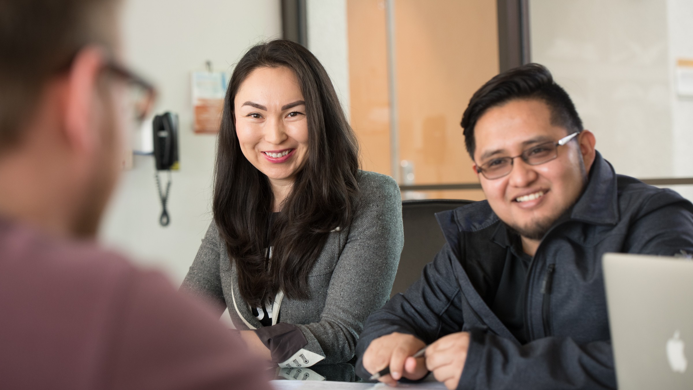 Two students seated in a classroom