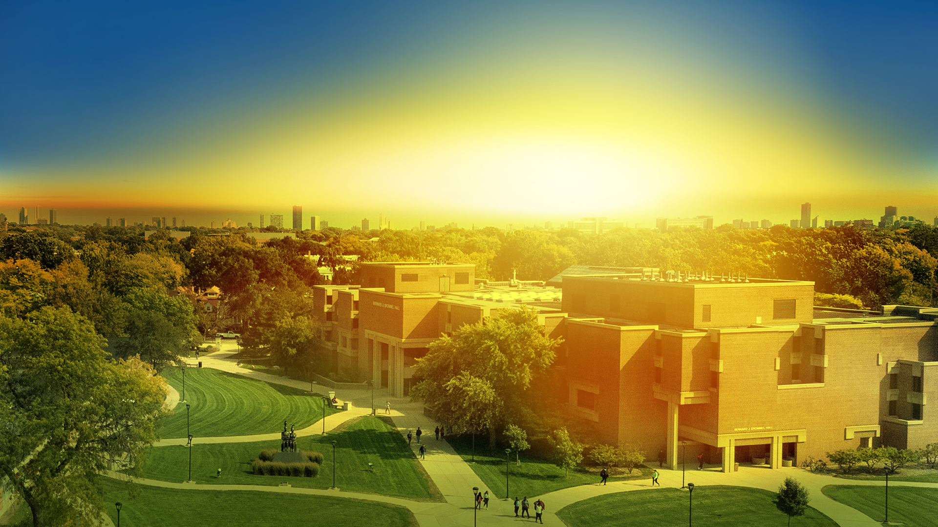 Stylized image of Main Campus with sunrise in background. 