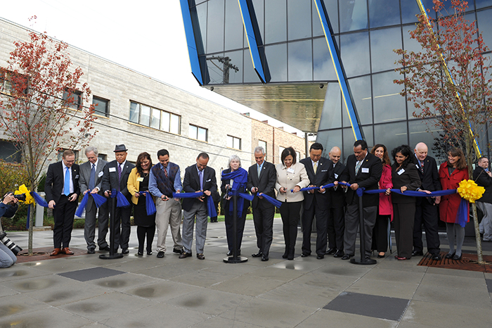 The ribbon is cut on the new El Centro building on Sept. 30, 2014.