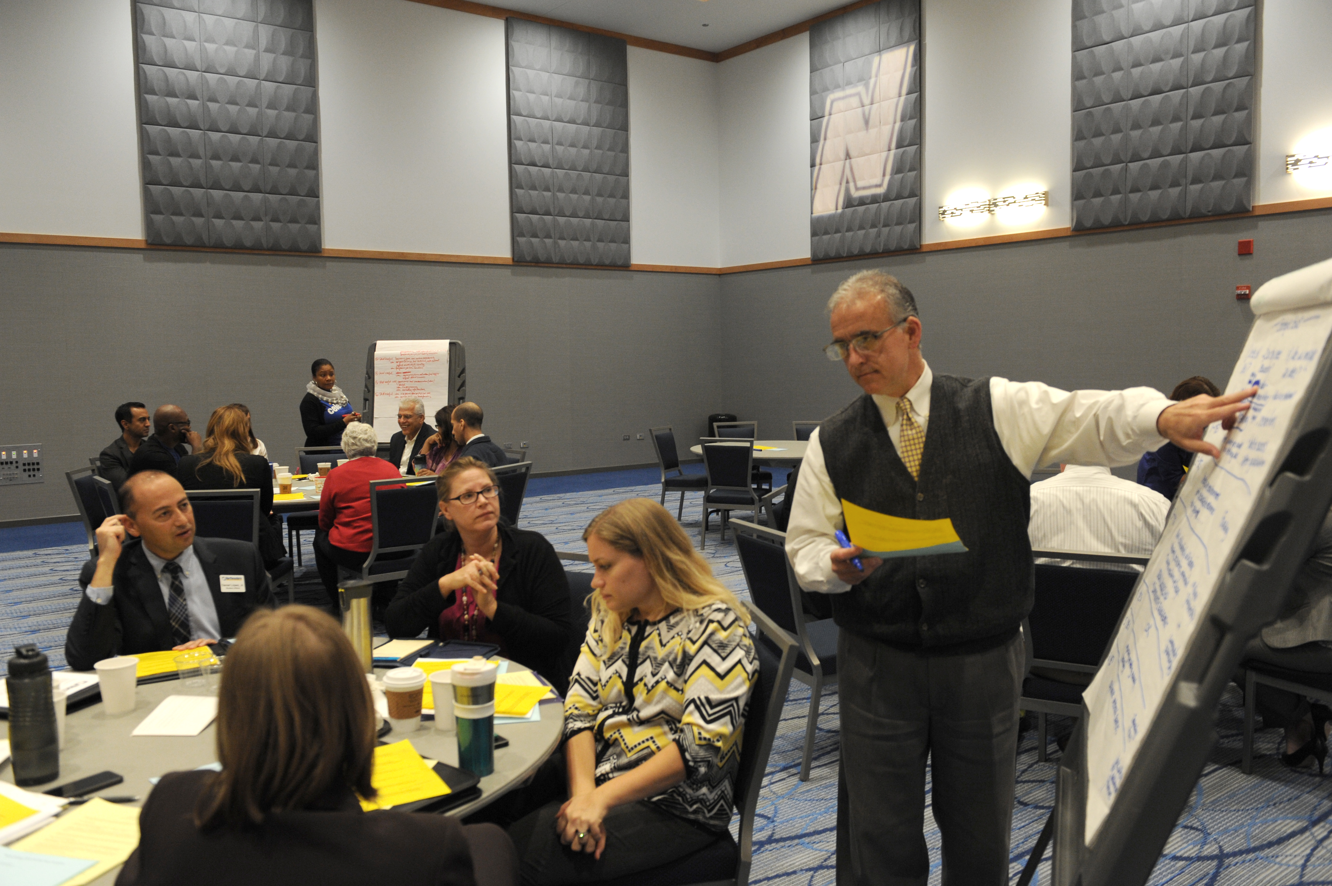 Northeastern Marketing Director Mark LaCien leads a table discussion during University Day.
