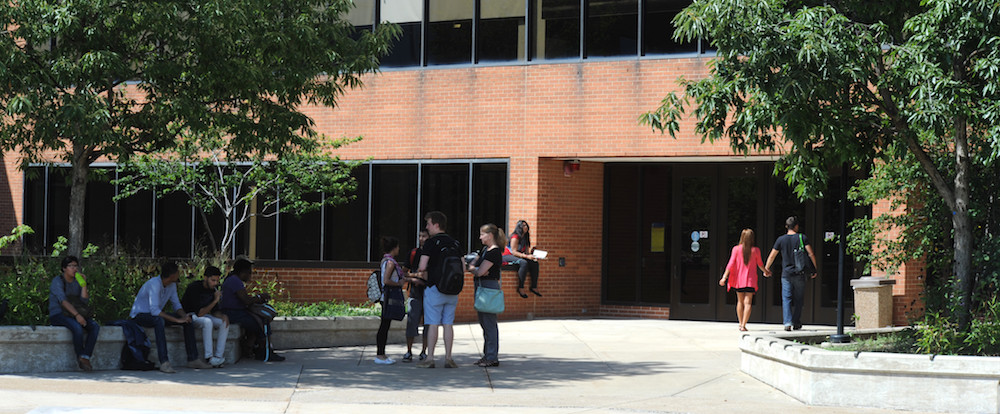 Students stand outside the Student Union building
