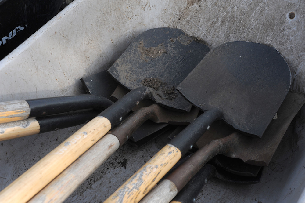 A stack of dirty shovels