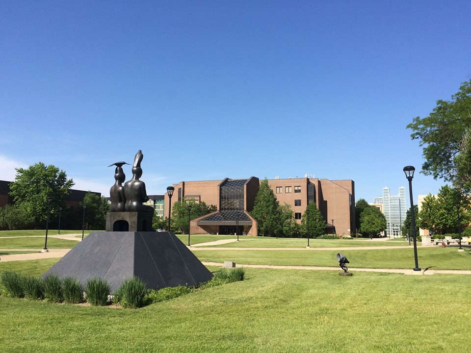 View of "Serenity" sculpture, University Commons and Ronald Williams Library