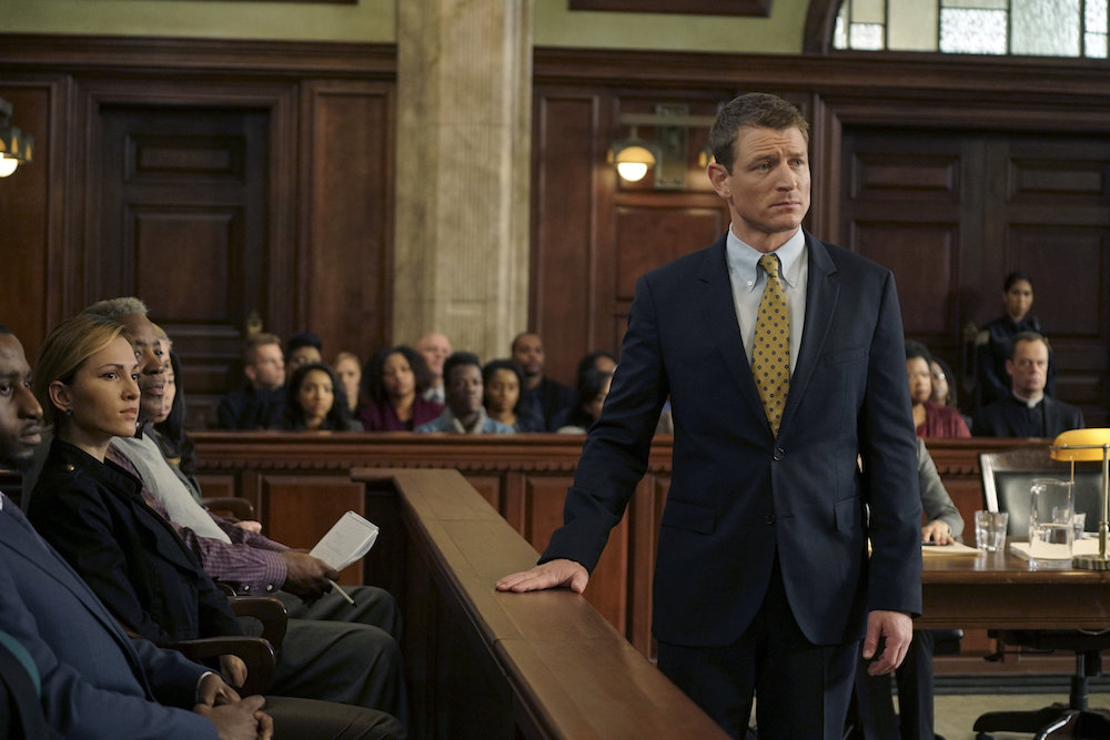 Promotional photo from "Chicago Justice" showing a courtroom scene