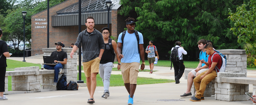 Northeastern students walk through the University commons.