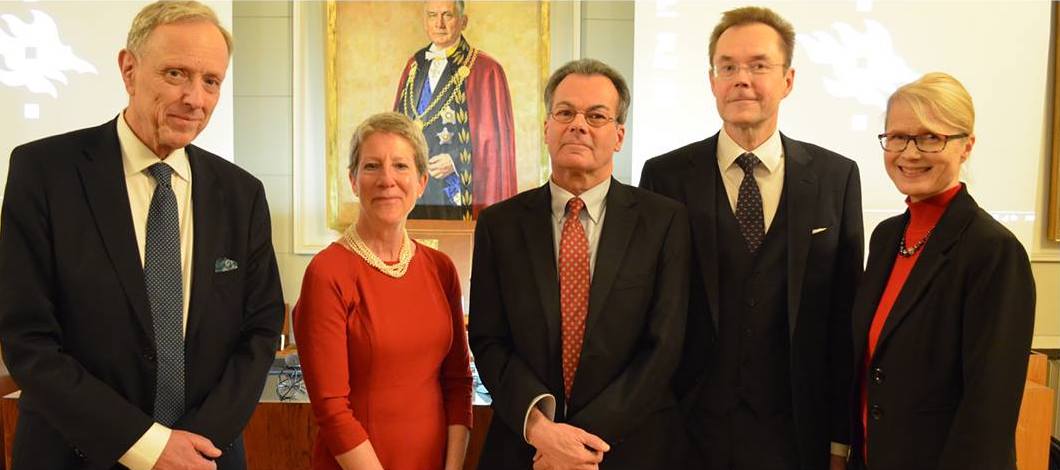 Northeastern Illinois University History Professor Patrick Miller (center) poses with (from left) Thomas Wilhelmsson, Chancellor of the University of Helsinki and Professor of Civil and Commercial Law; Donna Welton, Deputy Chief of Mission, U.S. Embassy in Finland; Mikko Saikku, McDonnell Douglas Professor of American Studies, University of Helsinki and President, Nordic Association for American Studies; and Terhi Mölsä, Chief Executive Officer, Fulbright Finland Foundation. The photo was taken at the J.W. 