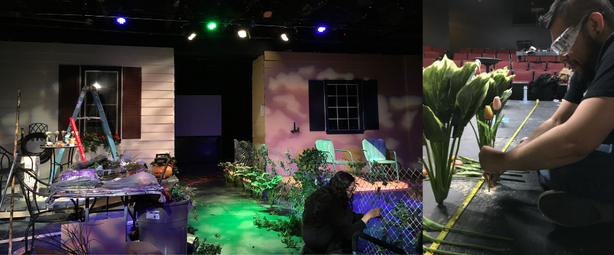 students work on adding fake foliage to the set