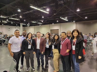 Nine students attending ABRCMS pose together