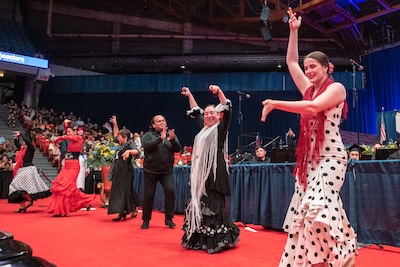 A photo of Ensemble Español Spanish dancers performing during the Commencement ceremony. 