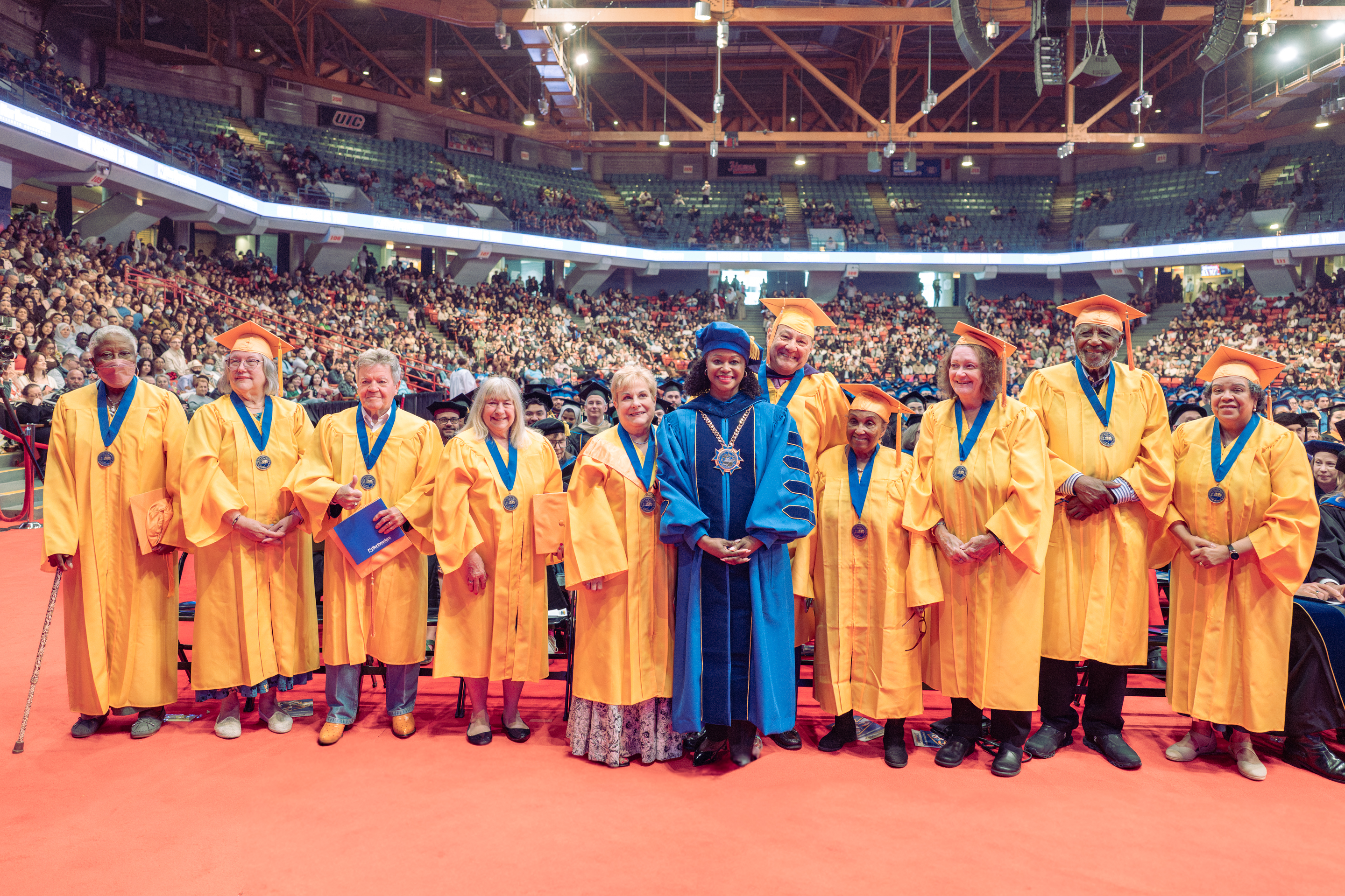 Golden alumni graduates pose for a photo with Pres. Katrina E. Bell-Jordan