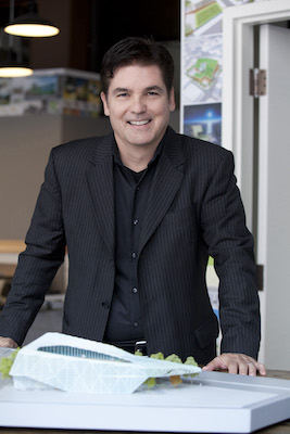 A photo of Juan Gabriel Moreno wearing a black suit