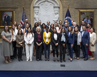 A group photo of the 2025 E. Kika De La Garza Fellows. Dr. Geddes is standing in the front row, third from the left.