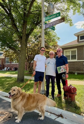 Paul Grossberg, Dean Ziemke, Sean Grossberg and their dog at the honorary street ceremony for James "Jim" Macdonald.