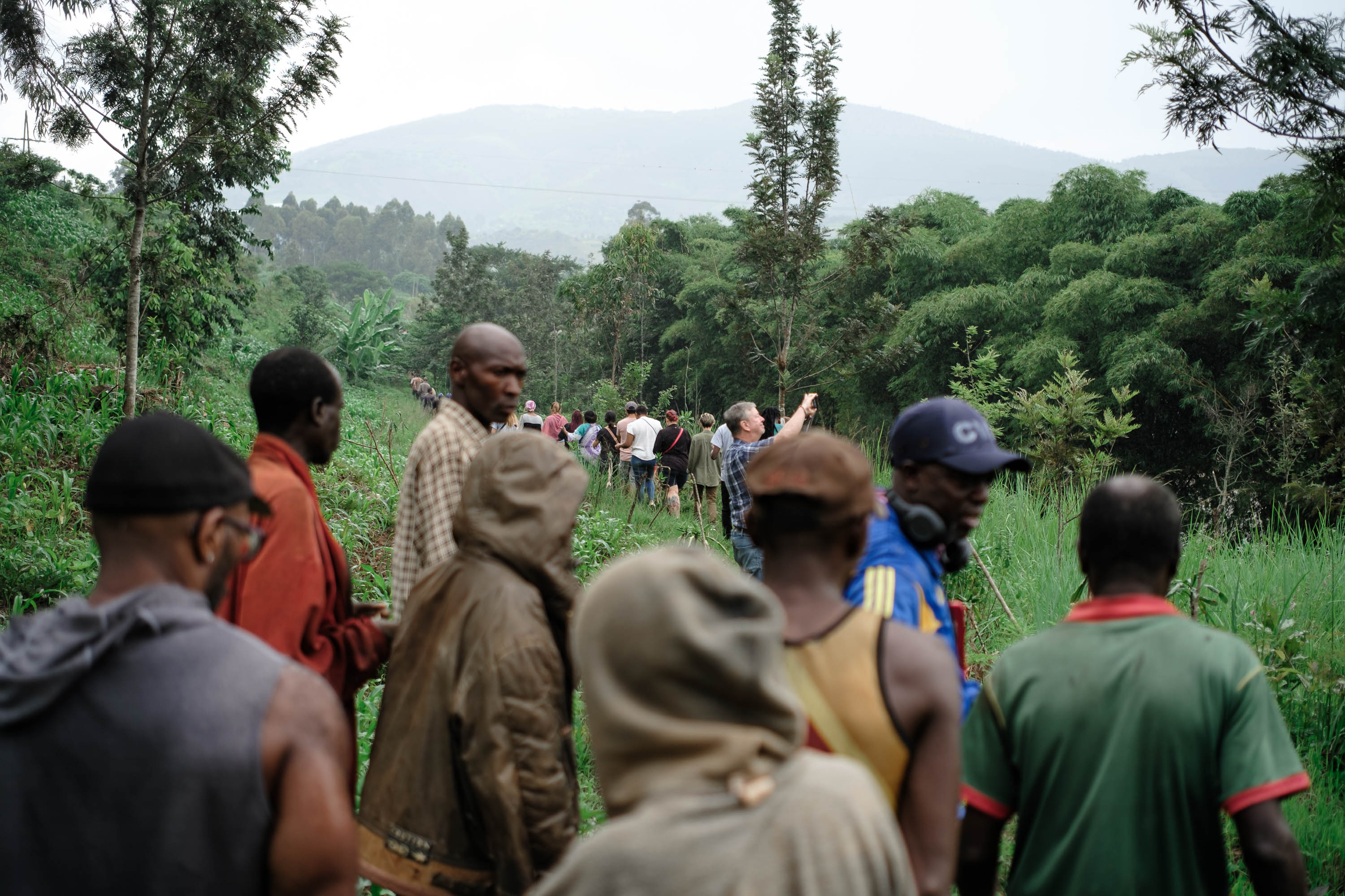 Travelers visiting mass graves near Gitega
