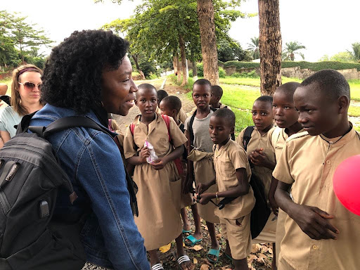 Bujumbura, Dr. Jeanine Ntihirageza with school youth after school, Burundi research trip December 2022