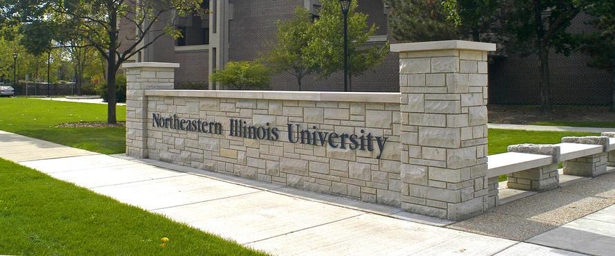 A photo of the Northeastern Illinois University entrance near Bernard J. Brommel Hall.