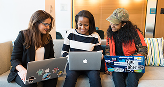 Three students studying.