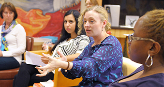 Students engaging in conversation during a class.