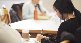 A student taking notes.