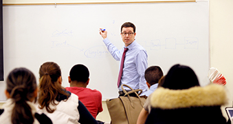 Male professor giving a lecture.