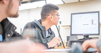 NEIU Students in a classroom.