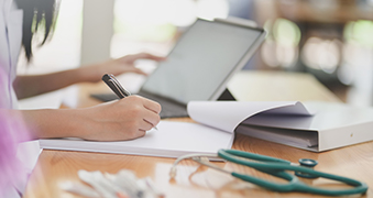 A student using a laptop.