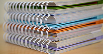 Spiral notebooks.