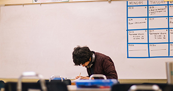 A student taking notes.