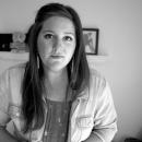 Lauren Meranda looks into the camera in a black and white image.