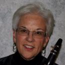 Gail Crosson Professional Headshot, holding clarinet