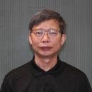 Professor Jian Li smiles into the camera.
