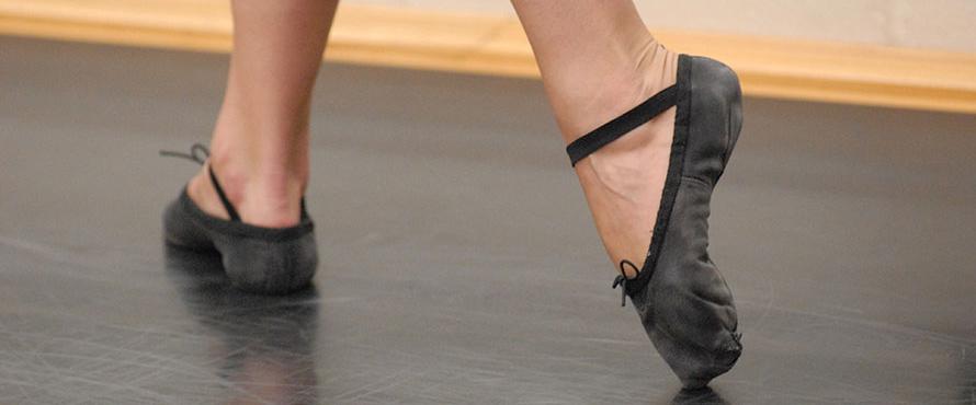 Ballet dancer feet in position during a rountine