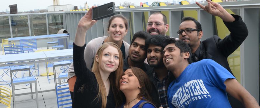 Students in a group taking a selfie