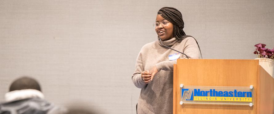 Photo of a person giving a speech during the a Black Student Networking event