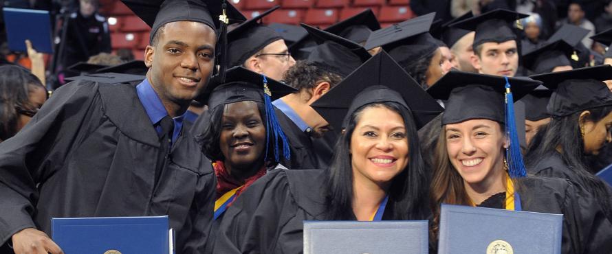McNair graduate receive their diplomas