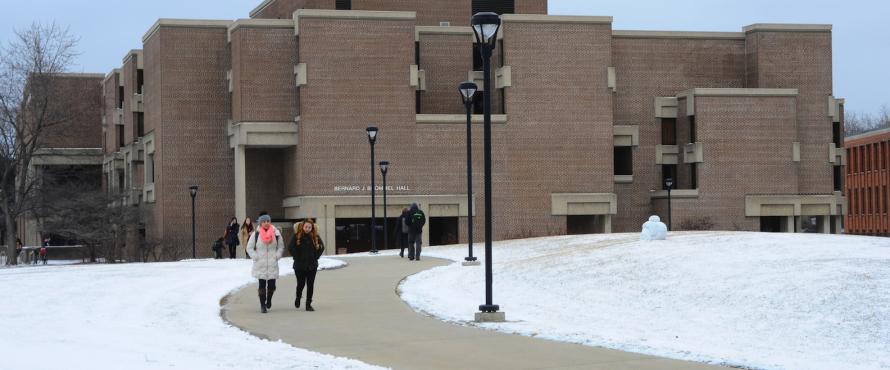Students walking outside of Bernard Brommel Hall