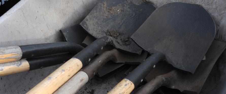 A stack of dirty shovels