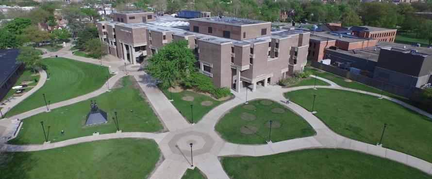 Aerial view of Bernard Brommel Hall with Chicago skyline on the horizon