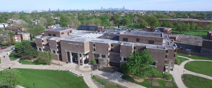 Aerial view of the University Commons and Bernard Brommel Hall with the Chicago skyline on the southeast horizon