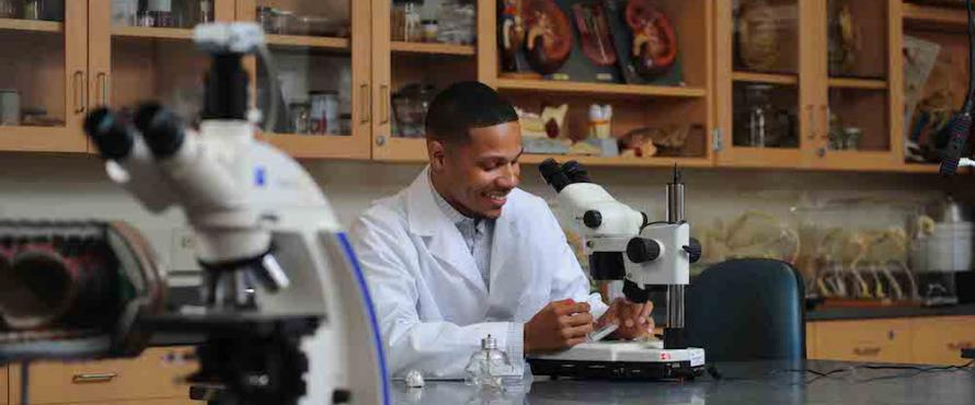 Biology major and McNair Scholar Anthony Smith works in the lab.