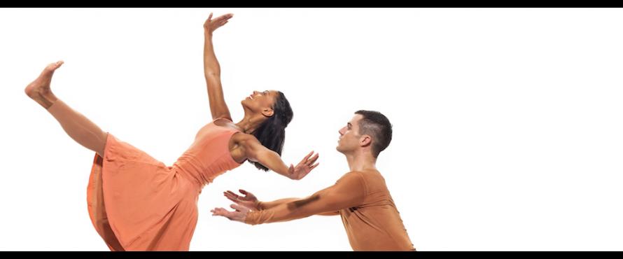 A woman (left) and a man dance together 