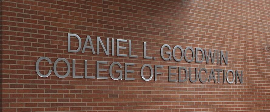 Brick will with the words Daniel L. Goodwin College of Education in silver lettering