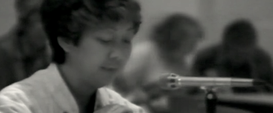 Screenshot of Kay Uno Kaneko giving her testimony during the Commission on the Wartime Relocation and Internment of Civilians hearings held at Northeastern in 1981